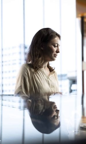 Determined woman leader developing a strategic plan for business growth, aligning the company efforts with the enterprise vision and market opportunities for global expansion.